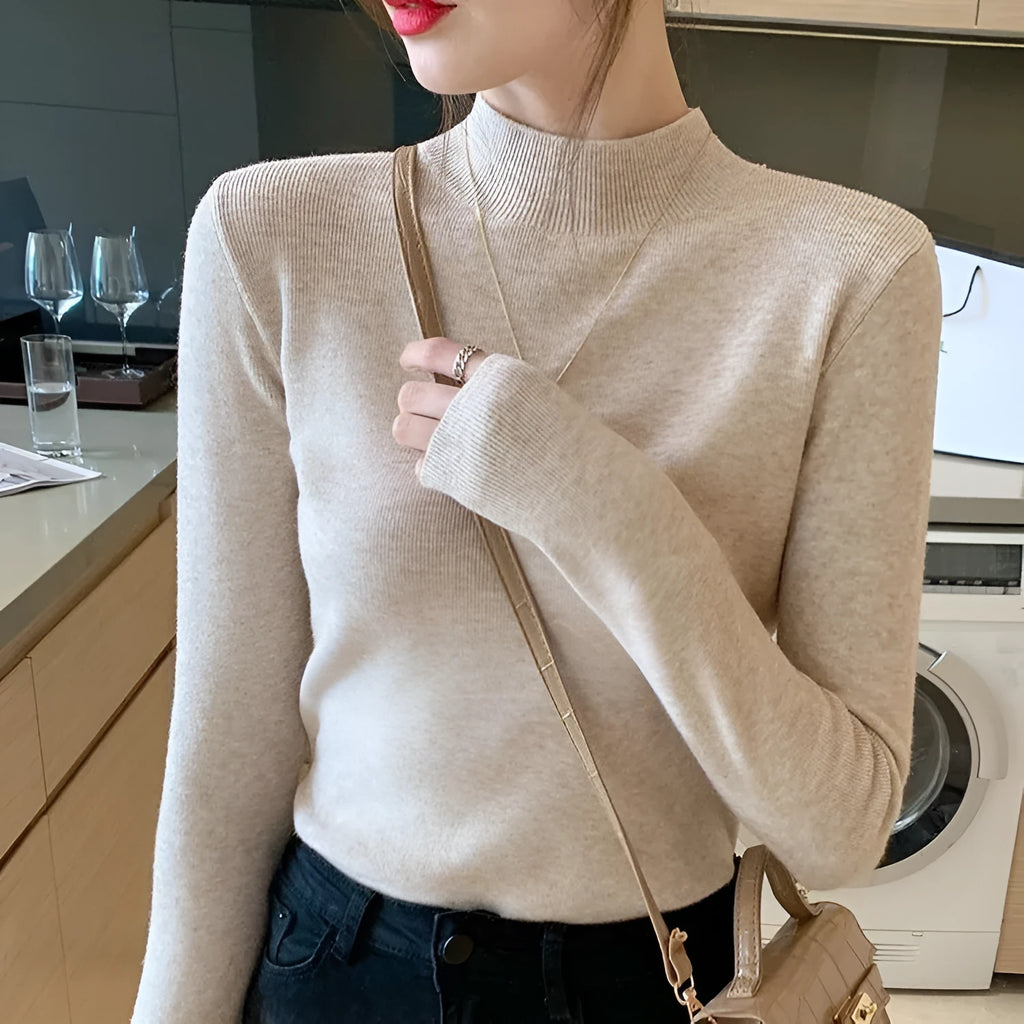 Slim fit knitted long sleeve bottoming shirt in viscose, shown in multiple colours.