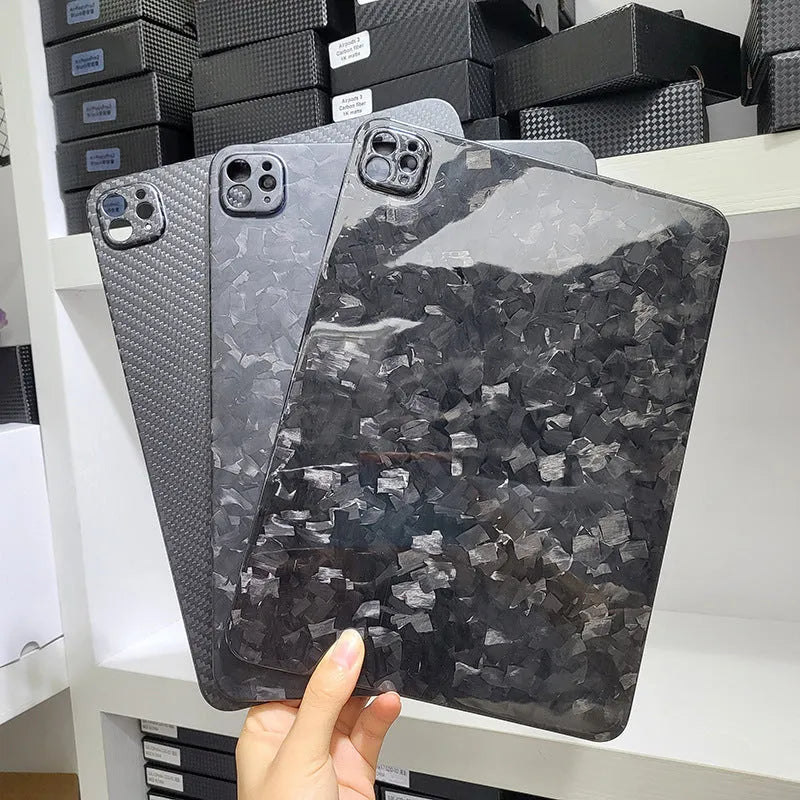 Real carbon fibre hard protective flat case for Apple iPad Pro 11 with an embossed plaid pattern.