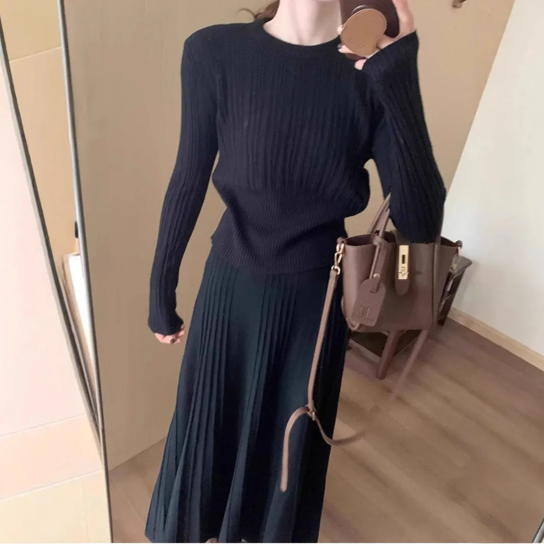 Women's dark grey knitted dress suit with 3D pattern, artistic retro style two-piece set.