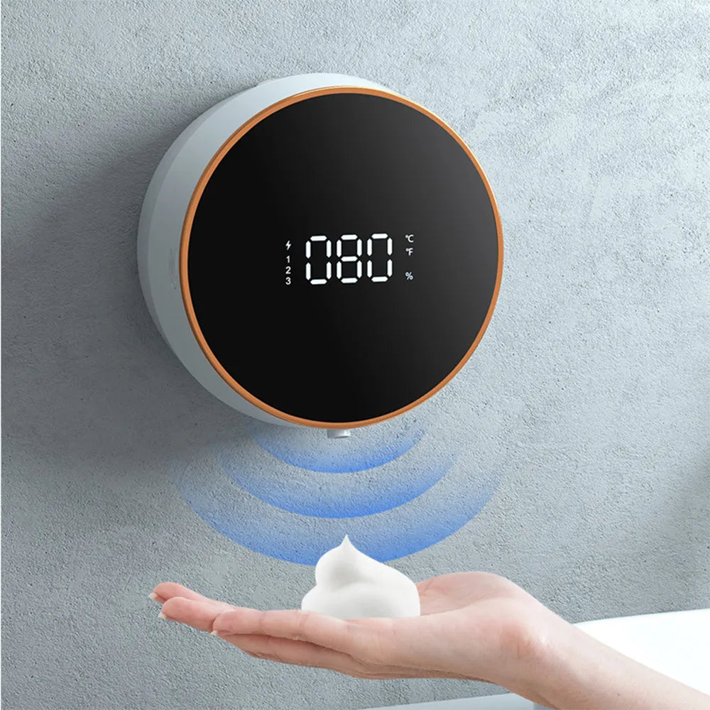 A black wall-mounted automatic foam soap dispenser with a sensor and USB charging port.