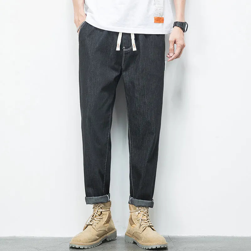 Men's loose plus size elastic waist straight leg jeans in blue denim