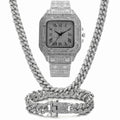 Roman numeral quartz watch with black mesh band, bracelet, and necklace set in gold colour.