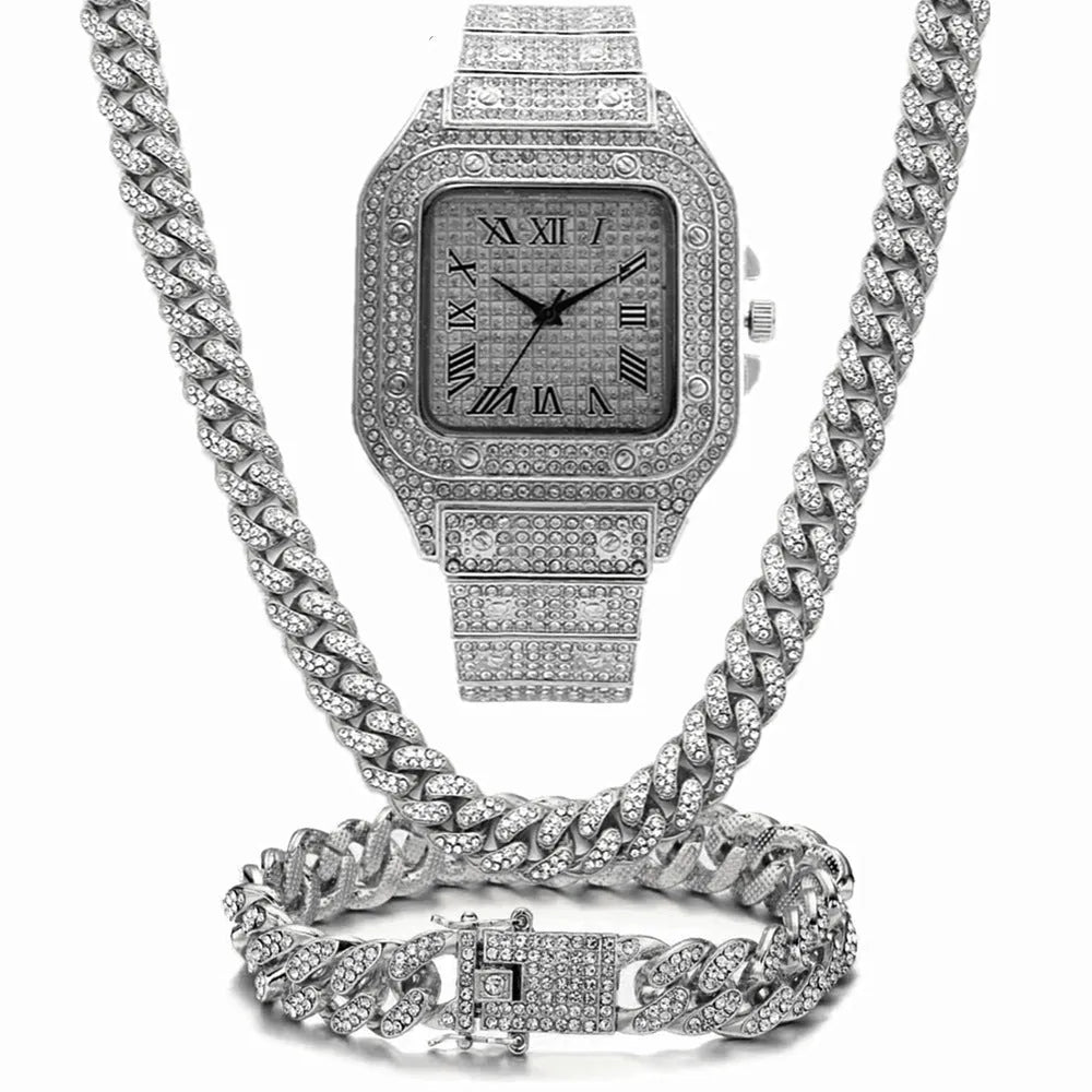 Roman numeral quartz watch with black mesh band, bracelet, and necklace set in gold colour.