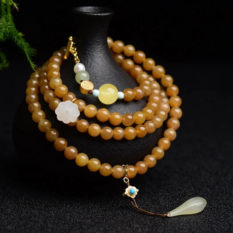 Green pine leaf jade bracelet with 6mm round beads in beeswax clear water colour