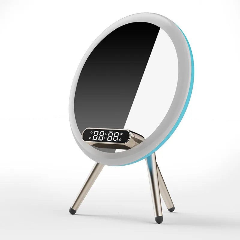 White multi-function LED mirror alarm clock with wireless charger and Bluetooth speaker on a table