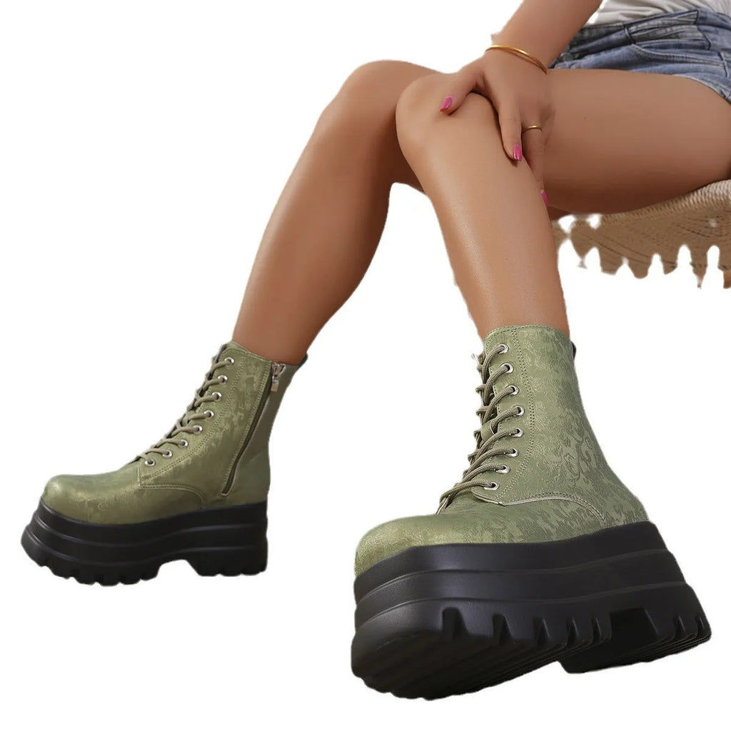 White women's retro mid-calf platform boots with a chunky heel and side zipper.