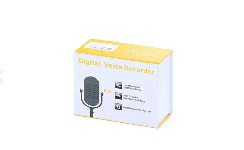 Small black or gold portable digital voice recorder with USB cable on a desk.