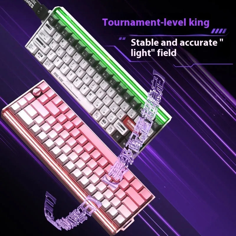 Compact mechanical keyboard with RGB backlighting and magnetic axis switches on a desk.