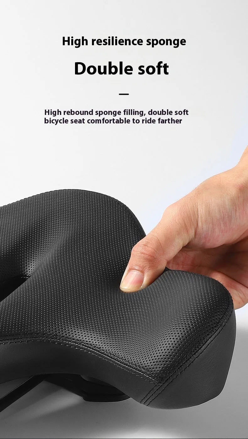 Black leather bicycle seat cushion with thick foam padding for shock absorption.