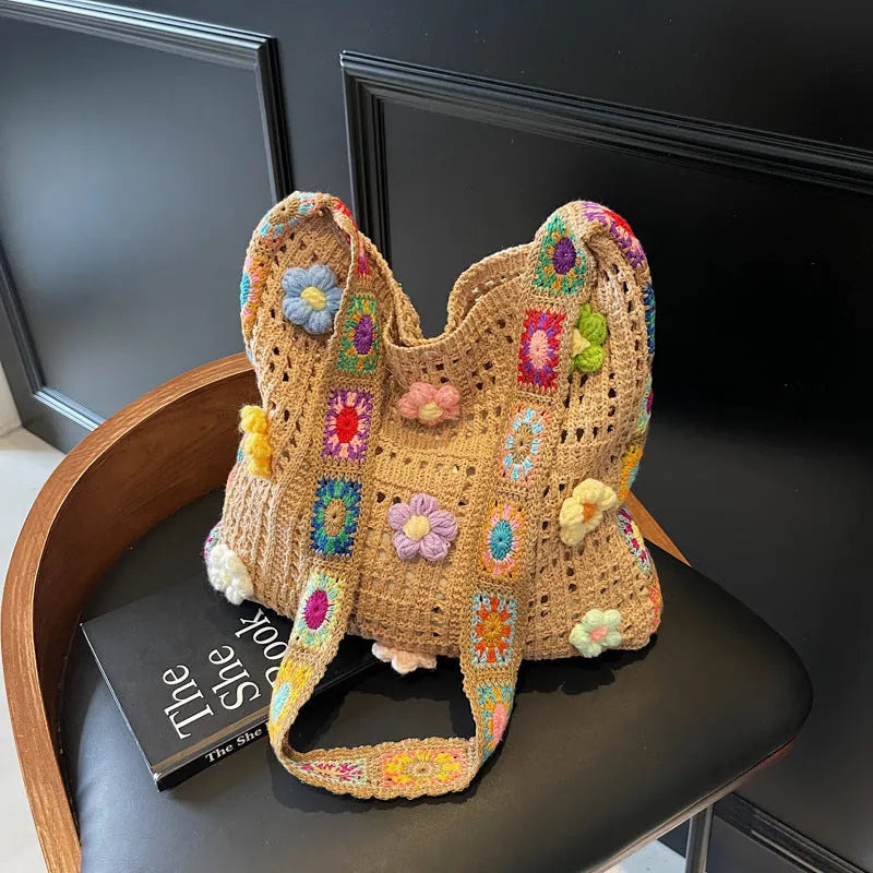 Women's woven beach shoulder bag in polyester with hollow knitted construction and single strap