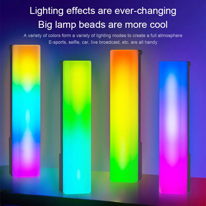 3D RGB voice-activated table lamp with colourful lights on a desk, showing white shell option.
