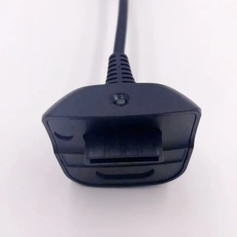Black Xbox controller charging cable with magnetic ring, 1.5m USB lead on a desk