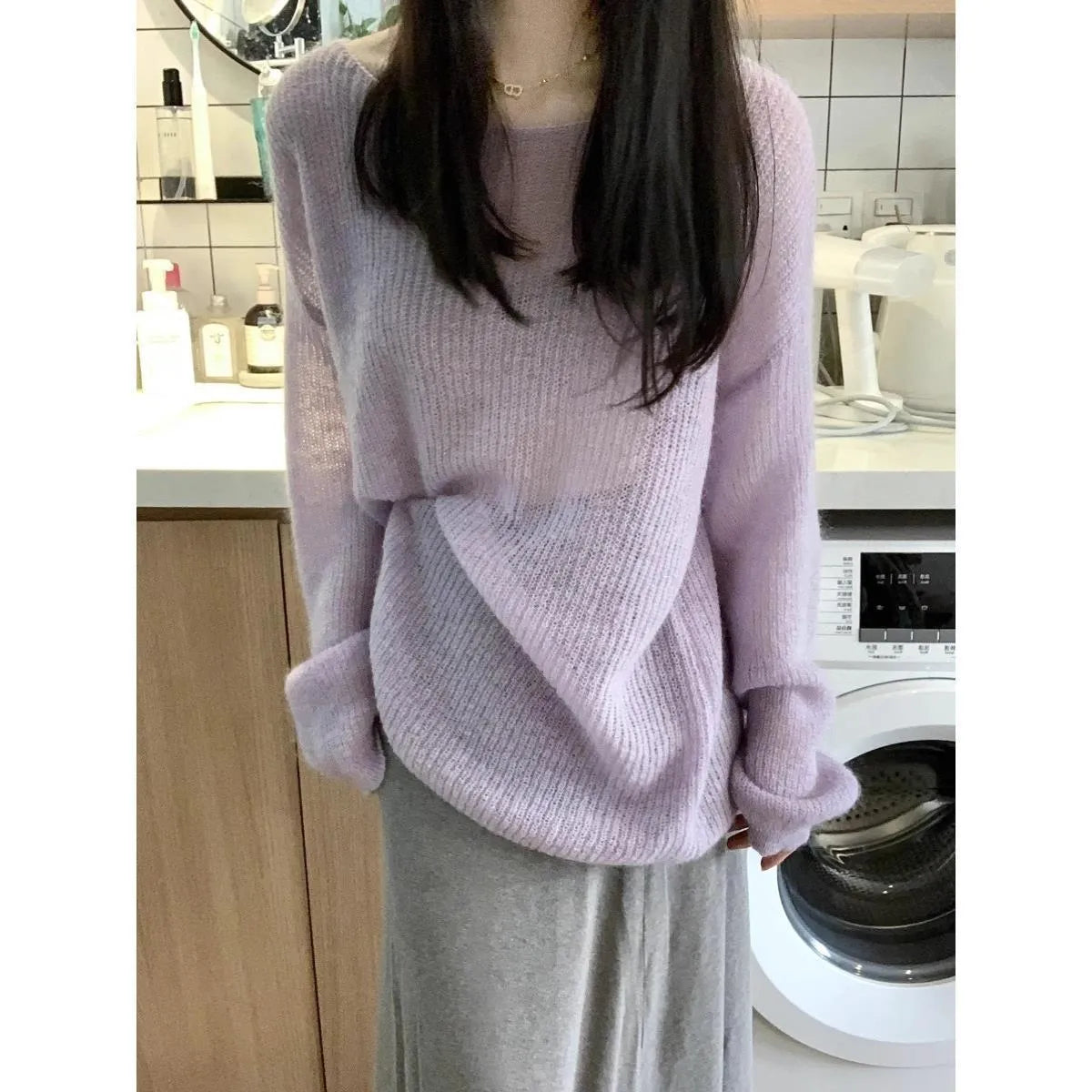 Purple women's sleeveless sweater with round neck and hollow-out pattern in ice silk fabric