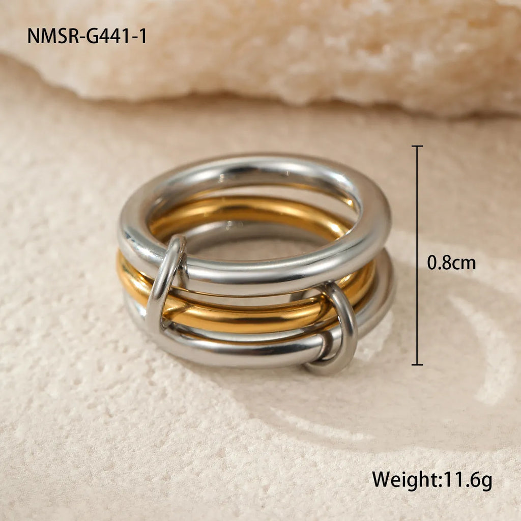 Stacked stainless steel women's ring with 18K gold plating in a colour-matched design.