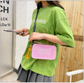 Transparent square jelly women's shoulder bag with adjustable strap shown in multiple colours.