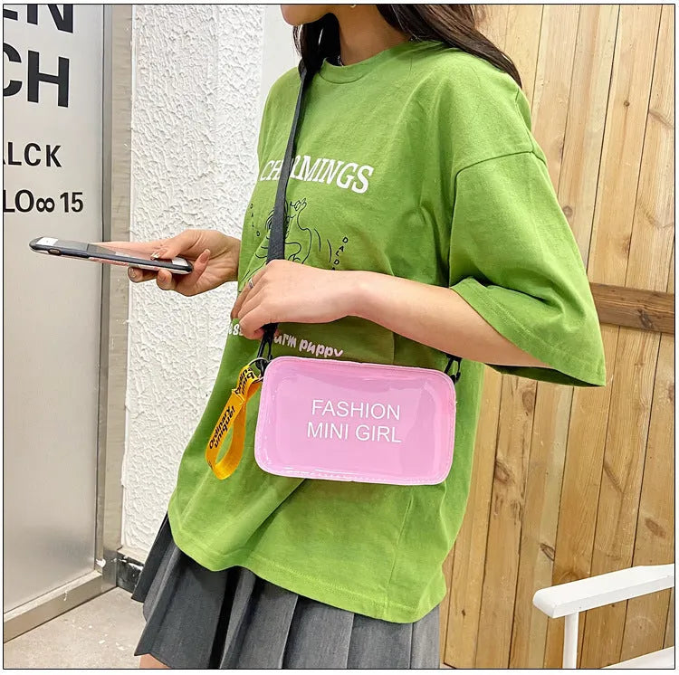 Transparent square jelly women's shoulder bag with adjustable strap shown in multiple colours.