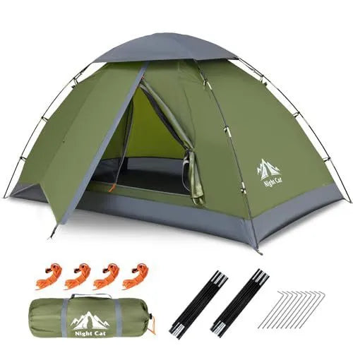 Dark green automatic pop-up two-person camping tent with waterproof rainfly shown in outdoor setting
