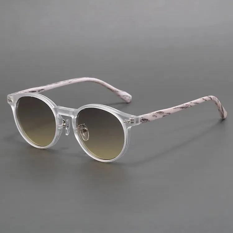 Retro frosted round rim sunglasses with UV-protection lenses in leopard print frame.