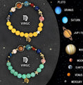 Two natural stone beaded bracelets with zodiac sign charms on a white background