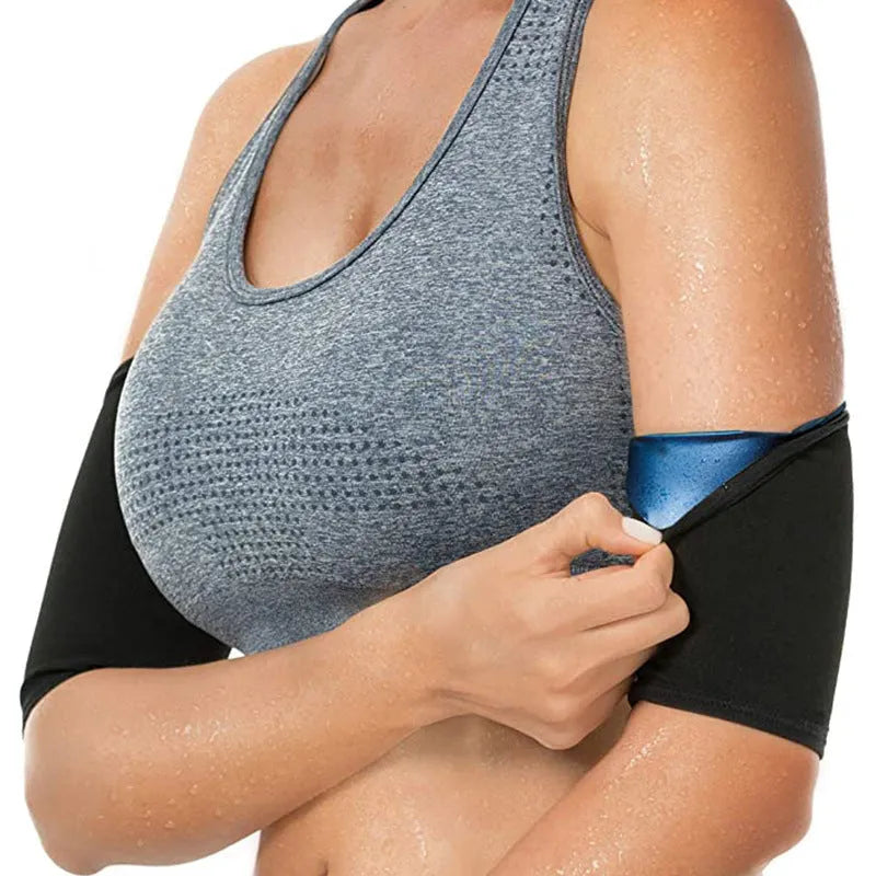 Compression sports arm sleeve in black and red colour, worn on forearm during workout.