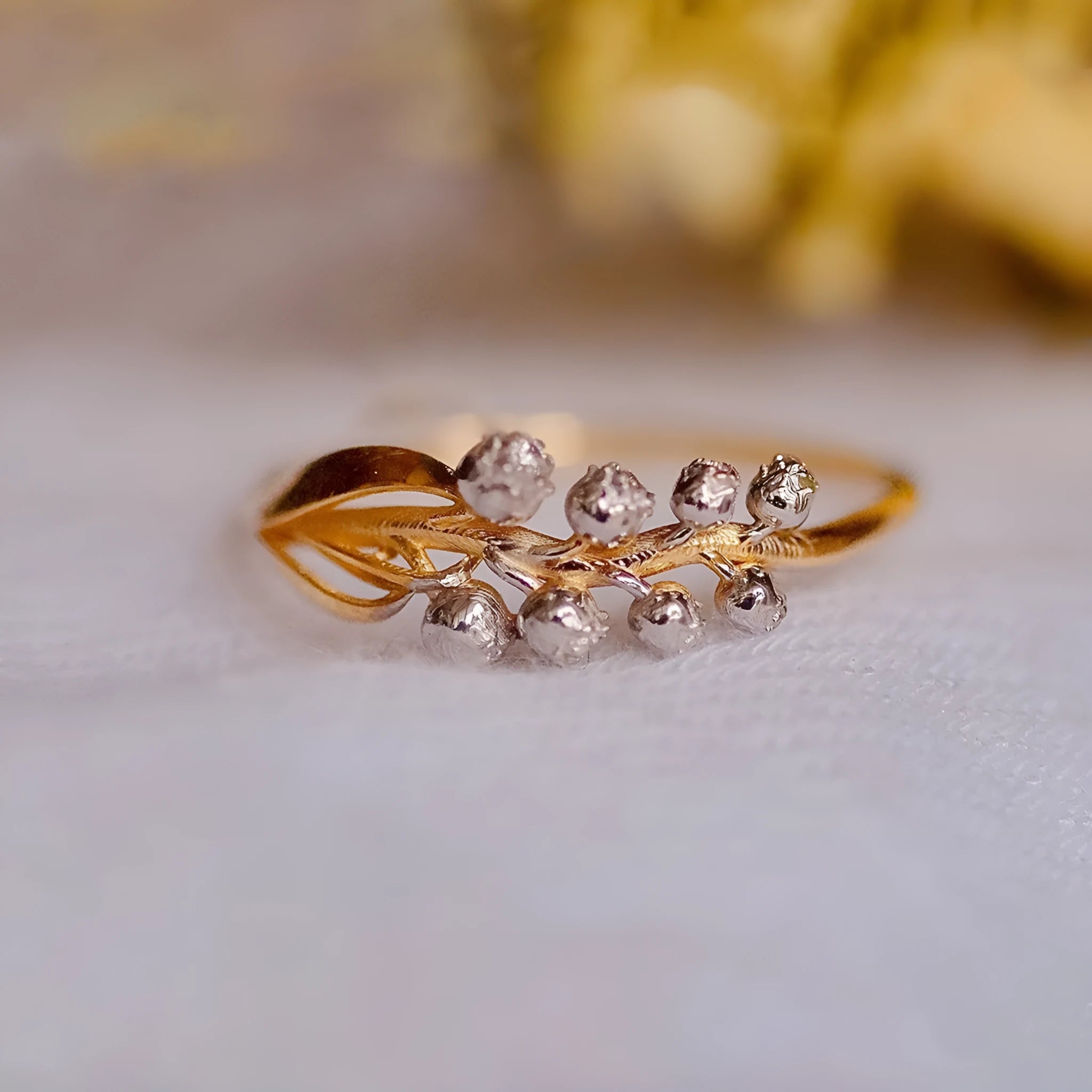 S925 pure silver bell orchid ring with micro inlay, champagne gold finish, on white background