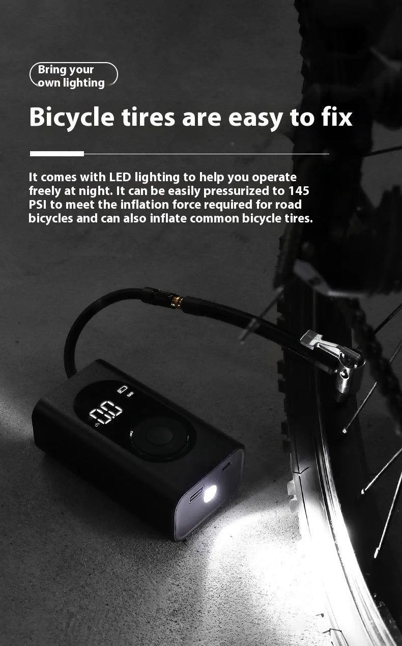 Portable handheld mini wireless tyre pump with power bank and flashlight on a grey background.