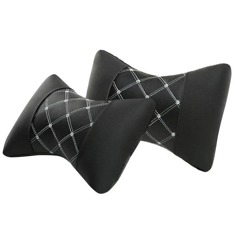 Black quilted diamond pattern car headrest neck pillow with contrasting piping options.