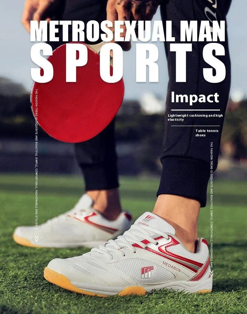 White table tennis sneakers with red trim, showing round toe and lace-up front.