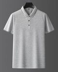 Men's pure colour mulberry silk short sleeve shirt in a light business style on a hanger.