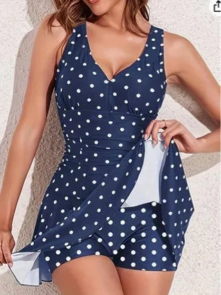 Blue polka dot print women's plus size bikini swimsuit top and briefs.