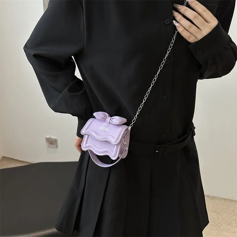 Mini crossbody bag in seven colour options with single shoulder strap