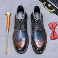 Men's curry blue leather brogue boots with decorative stitching and front lacing.