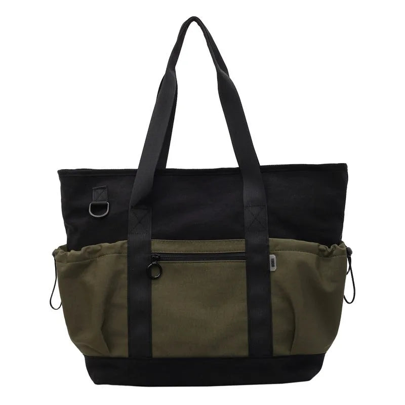 Lightweight Oxford cloth duffel bag for women in grey, shown with a yoga mat.