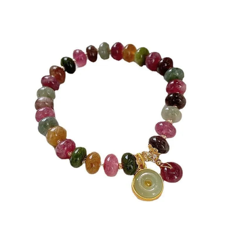Colourful tourmaline rabbit pendant on a natural stone abacus bead bracelet.