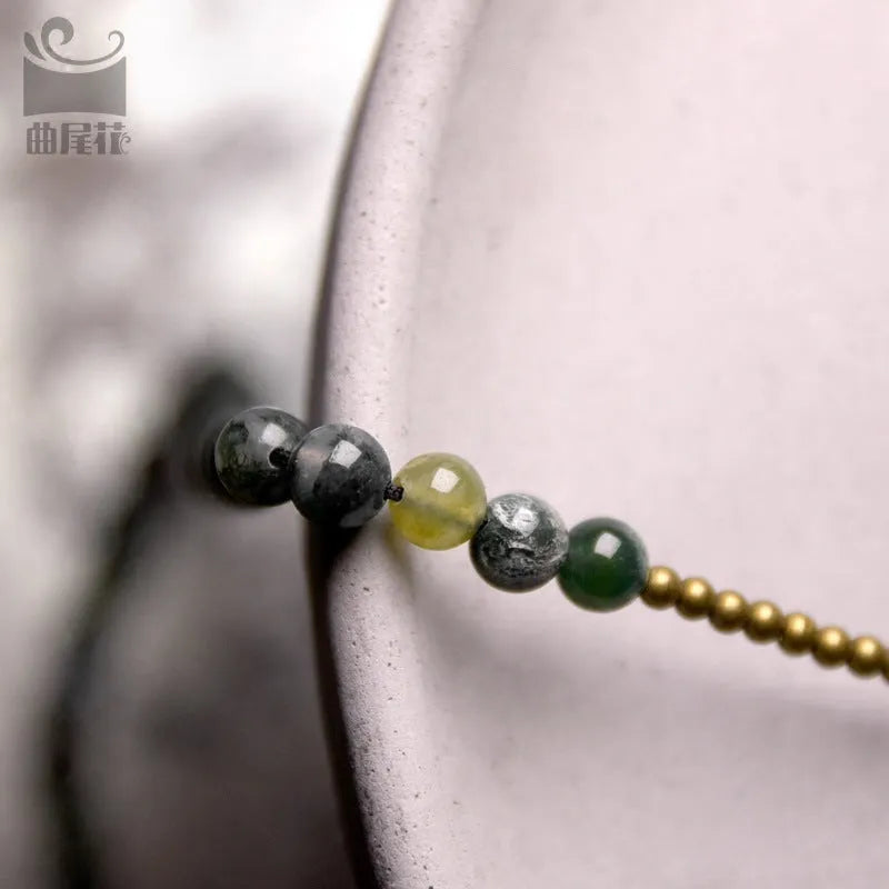Multi-layered ethnic-style children's bracelet in natural crystal, shown in size 16 yards for girls.