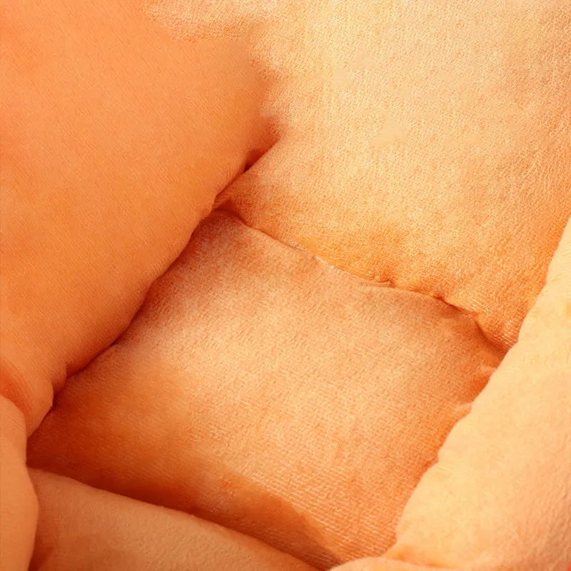 Large and medium sized dog nesting bed with a soft, removable washable blanket.