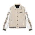 Women's apricot bomber jacket with bone embroidery on sleeves and ribbed cotton blend collar