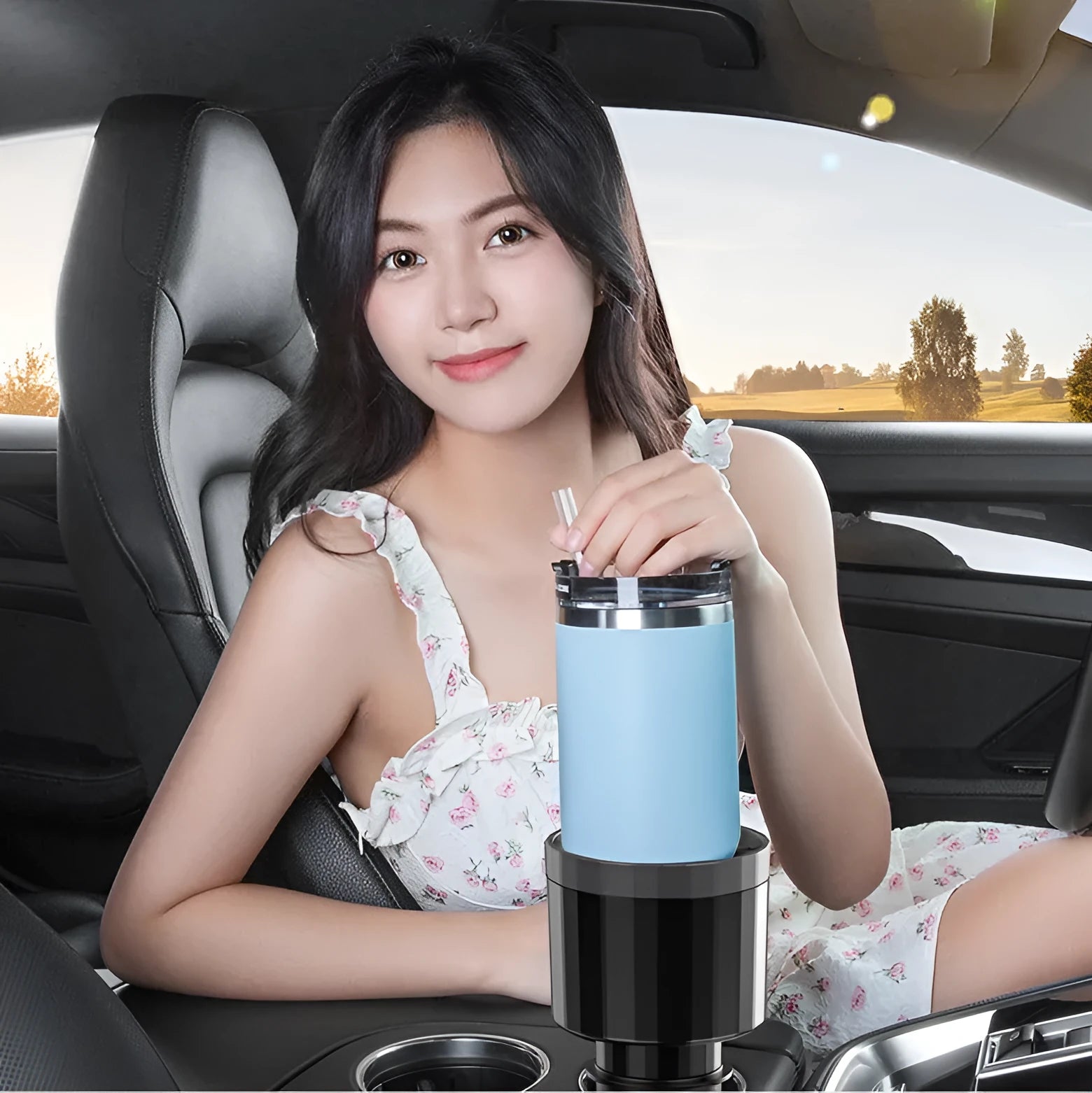 Matte black adjustable car cup holder expander for large bottles and cups.