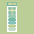 Pack of colourful sticky notes showing eight different colour covers including blue, green, and pink designs.