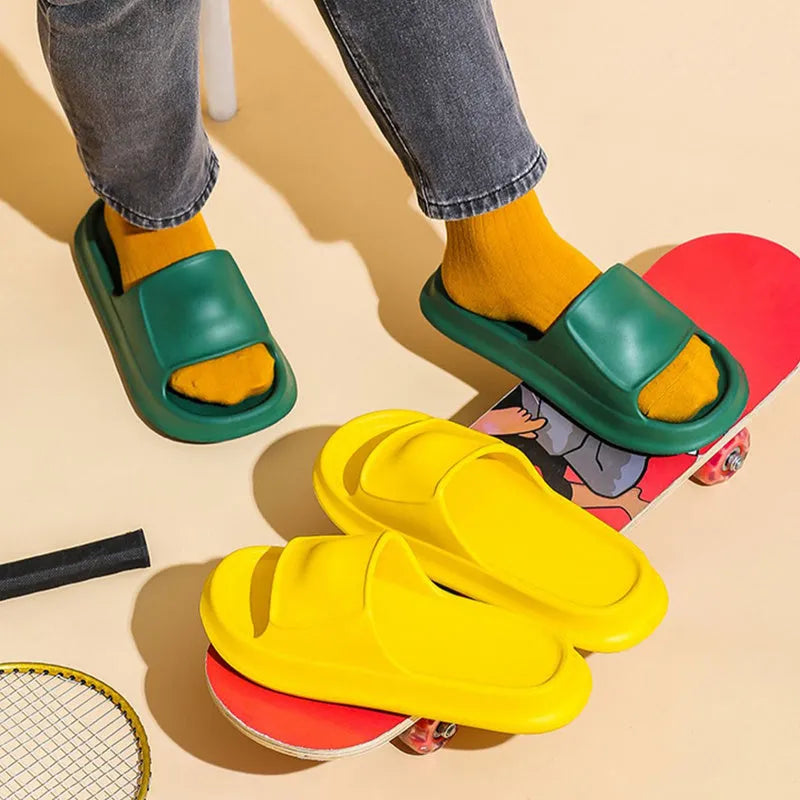 Soft EVA flip-flop slippers with a thick non-slip sole, shown in multiple colours on a white background.