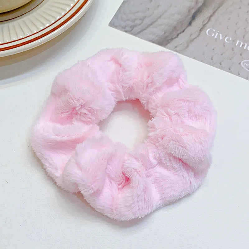 Solid colour cloth hair ring in round ring style with loose fit, available in multiple colours