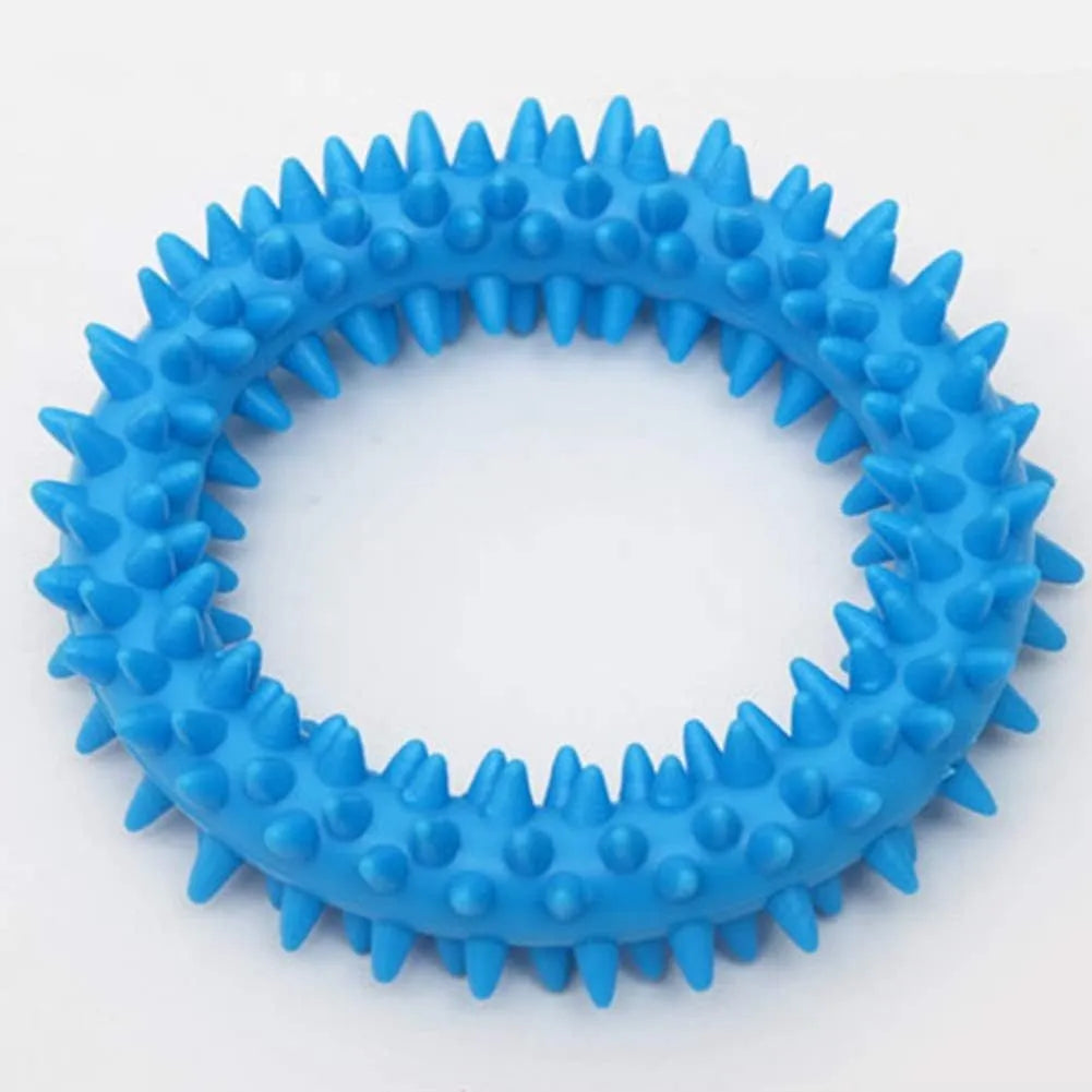 Blue TPR spiky circle ring dog chew toy for teeth cleaning on a white background.