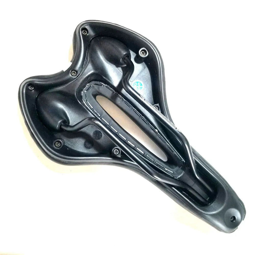 Soft silicone bicycle saddle cushion with black PU leather cover, shown with included waterproof cover, wrench, and puncture repair kit.