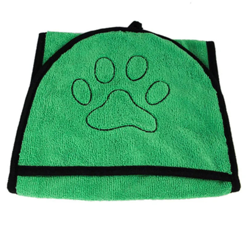 Pet absorbent dog bath towel in blue, green, and grey plain design drying a dog after bath