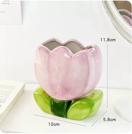 Ceramic flower pen holder storage box in a floral design on a desk