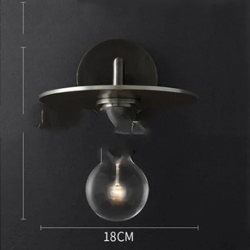 Modern wrought iron glass wall lamp with gold bronze finish and triangular transparent glass shade