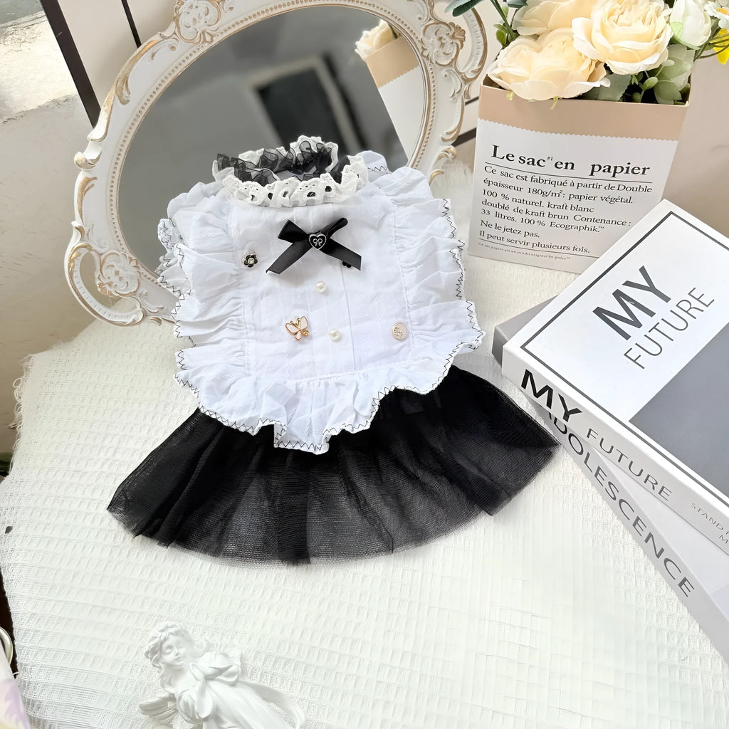 White polyester gauze skirt for a small dog, showing princess style and tiered design on a mannequin.