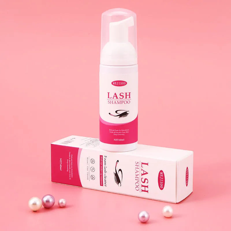 60ml bottle of lash shampoo mousse eyelash cleaning solution with a pump dispenser.