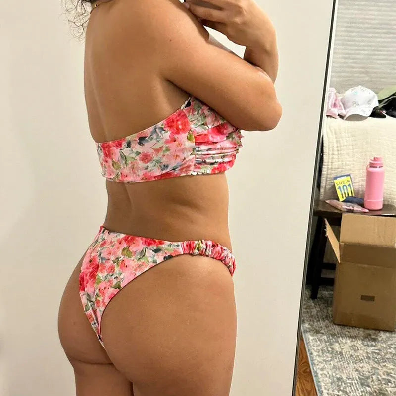Women's polyester bikini set with floral print tube top and matching briefs for swimming.