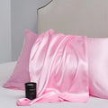 A pair of solid colour satin pillowcases made from polyester fibre, shown in one of 13 available colours.